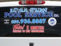 Logo & lettering on back window of vehicle